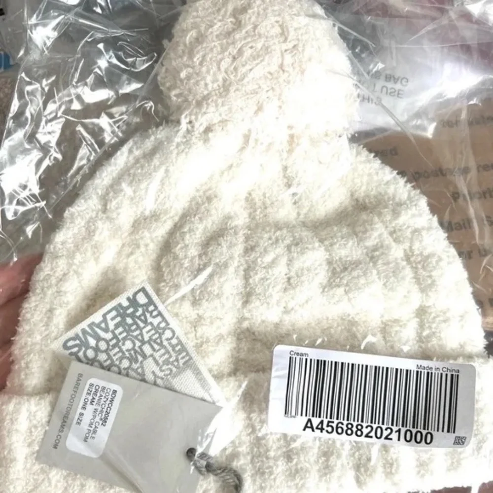 BAREFOOT DREAMS COZY CHIC CABLE BEANIE WITH POM POM IN CREAM